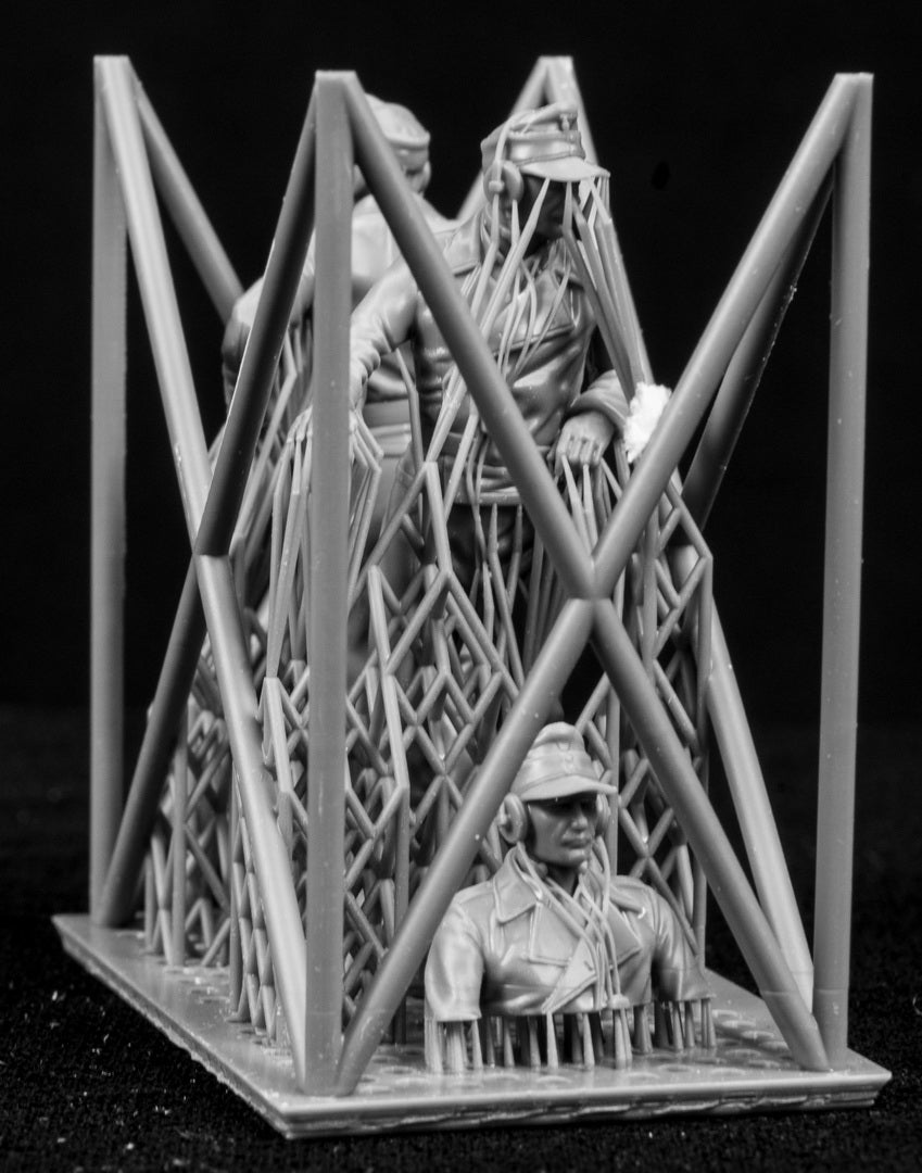 Three 3D Printed figures on a frame set on a black background.