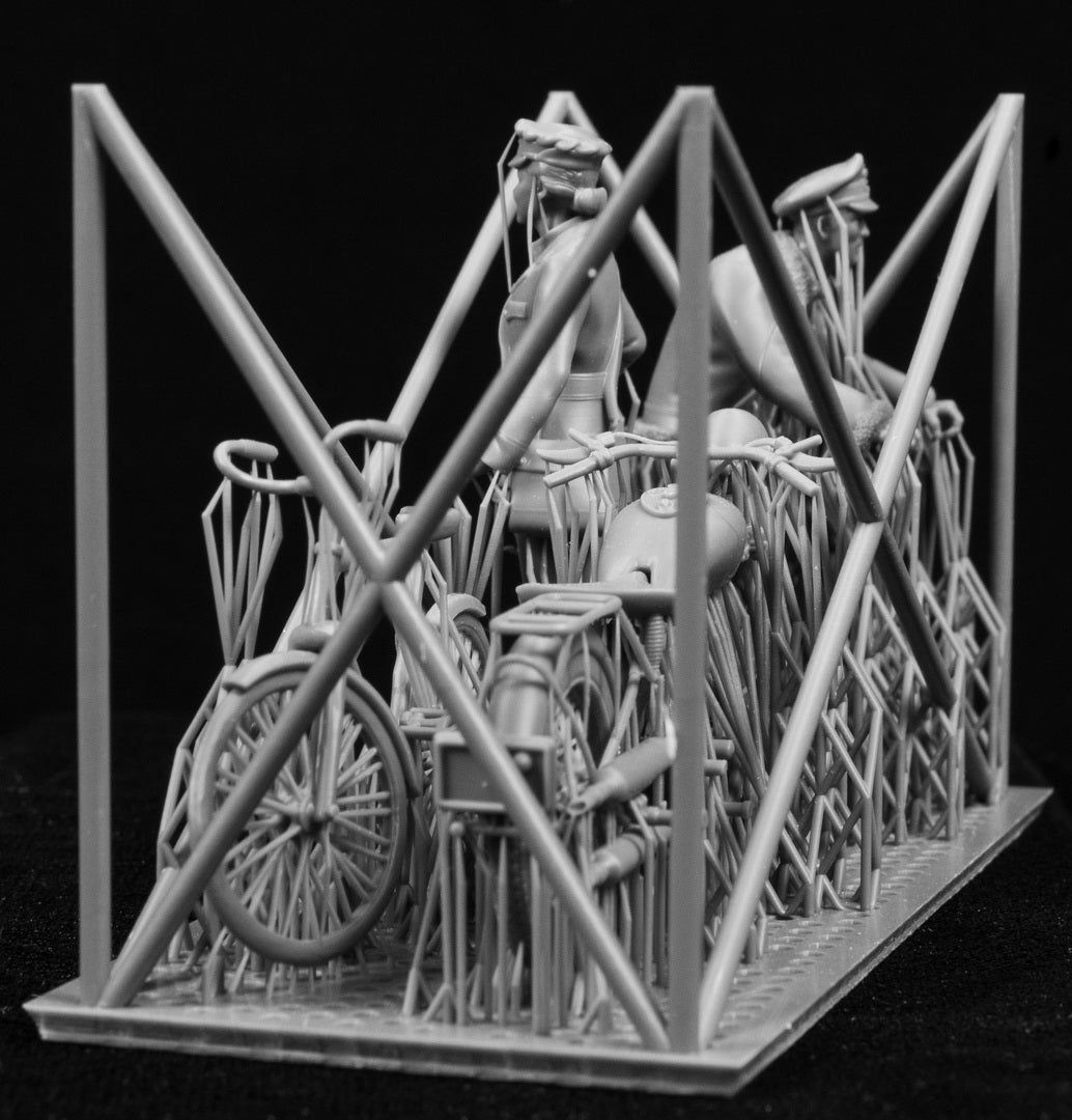 3D printed 1/32 RCAF & Commonwealth Cycling Pilot and WAAF. Two figures, a motorcycle and bicycle on a frame with a black background.