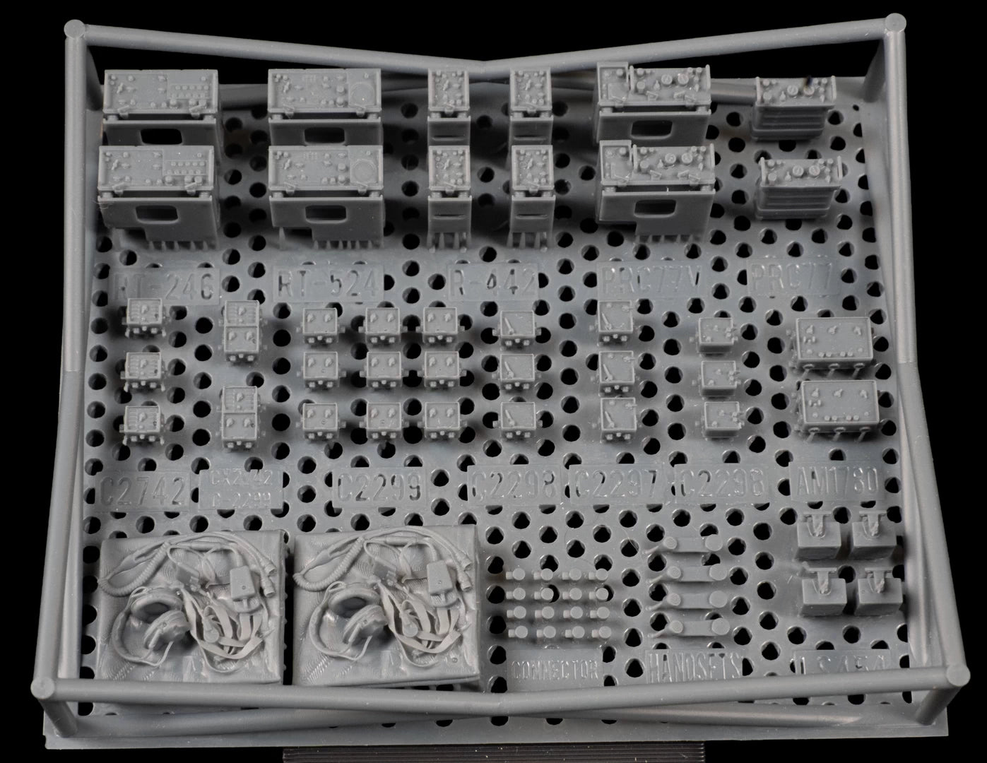 1/35 Scale US-NATO 1960s-90s Radio Sets Parts on raft with protective sides.