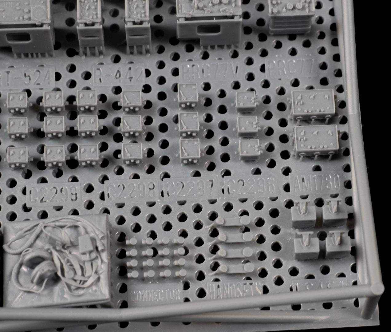 1/35 Scale US-NATO 1960s-90s Radio Sets Parts on raft with protective sides.