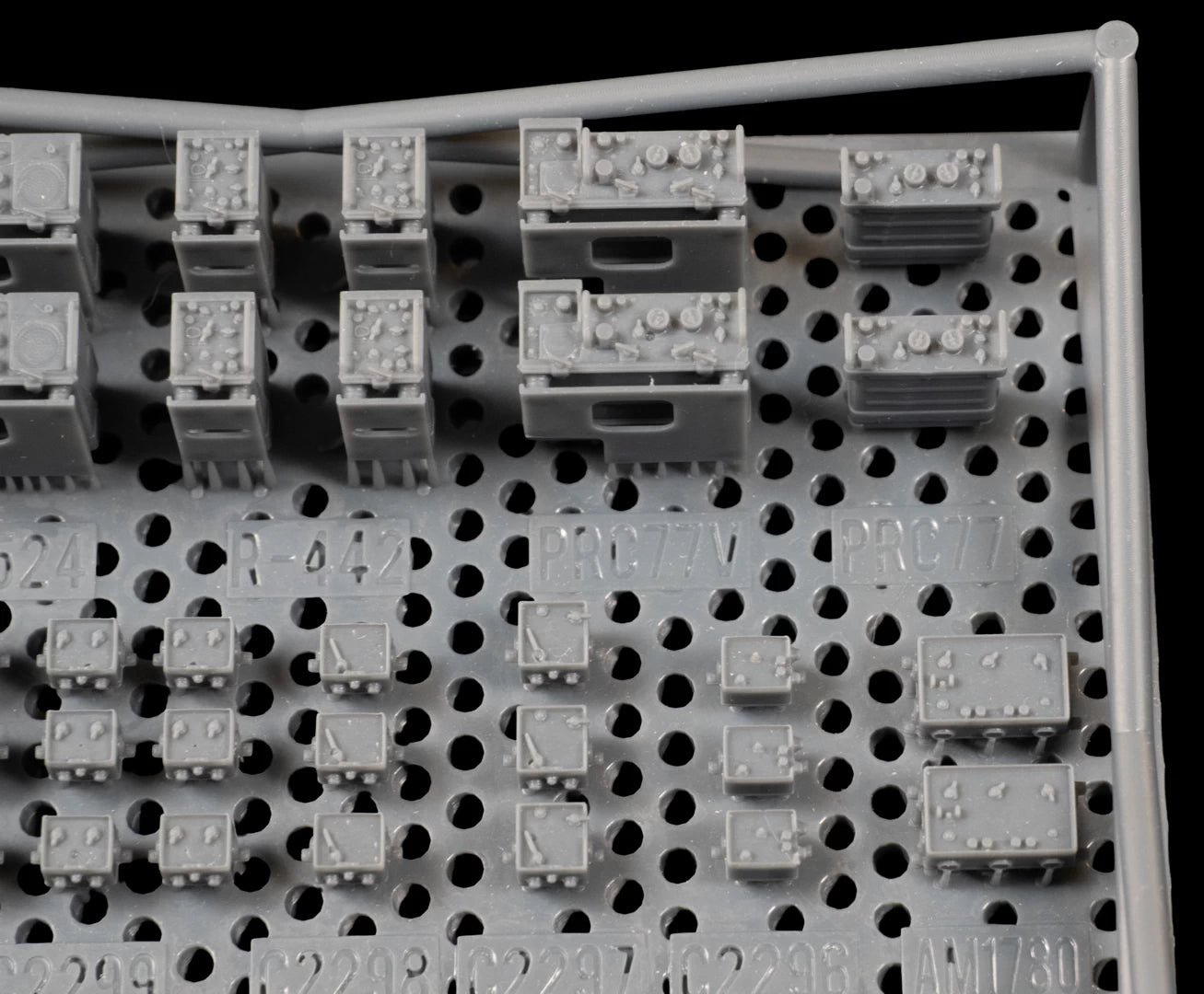 1/35 Scale US-NATO 1960s-90s Radio Sets Parts on raft with protective sides.